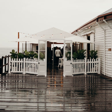 French Doorway Arch with White Picket Fencing