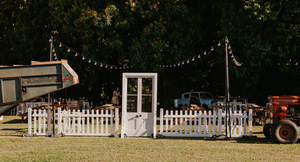 French Doorway Arch with White Picket Fencing
